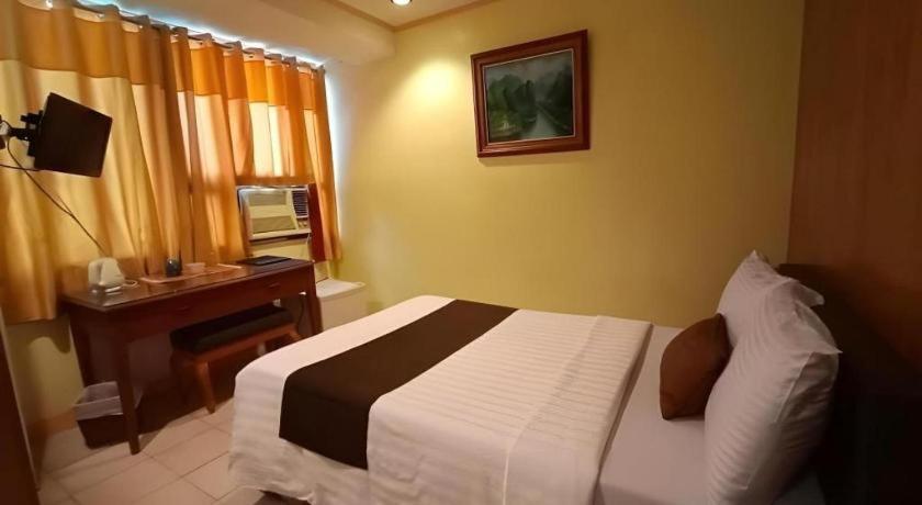 Hotel Asuncion Laoag Buitenkant foto